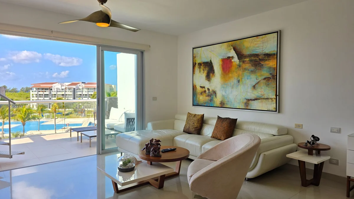 Bright living room opening to the balcony