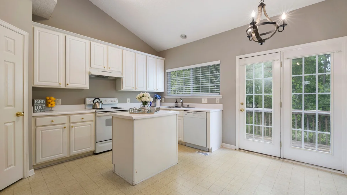 Kitchen with island and deck access